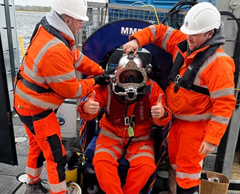 Diver prepares for Penstock underwater dive