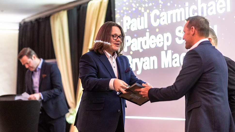 Bryan mackie receiving his Expect award for 3D model creation