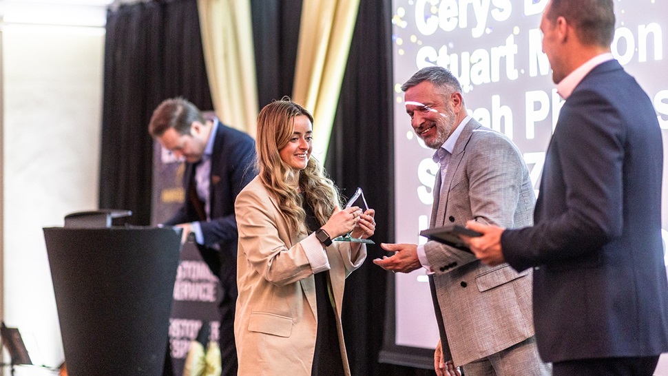 Harriet Watson receiving her award